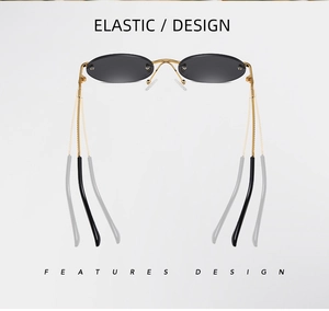 Close-up of flexible gold metal temples and oval rimless lenses for punk sunglasses