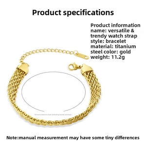 Detail of the gold watch strap style mesh chain with lobster clasp and extension