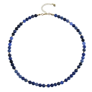 Detail of blue tiger eye beaded necklace with gold heart clasp and extension chain