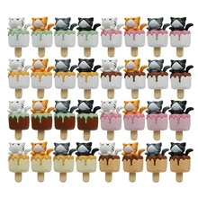 Detailed grid view of assorted cute cat ice cream figurines in various vibrant colors