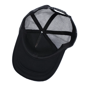 Inside view of black trucker hat with mesh panels and adjustable snapback closure