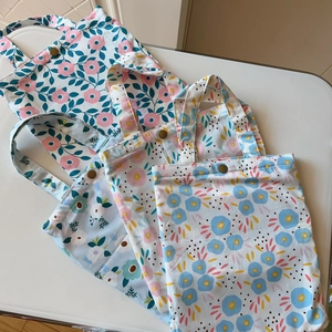 Selection of floral cotton handbags with vintage copper buttons and rustic patterns