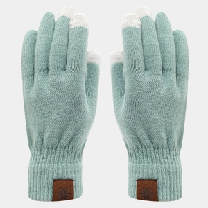 Close-up of mint green knit gloves with touch screen fingertips and snowflake leather patch