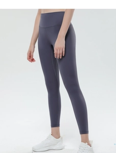 Detailed close-up of high-waisted peach lift yoga leggings in charcoal grey fabric
