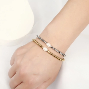Minimalist gold and silver beaded bracelets with elegant white freshwater pearls for women