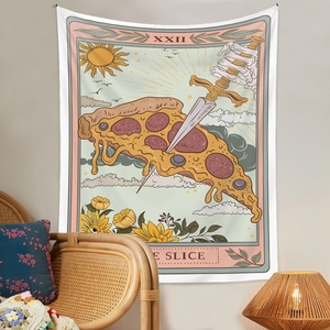 Detail of bohemian tapestry with tarot design hanging in a cozy living room setup