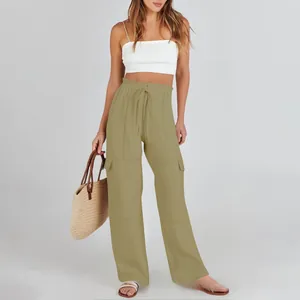 Detail of high-waisted cargo pants showing drawstring waist and large side pockets