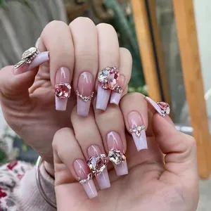 Pink heart crystal charms on long coffin French gradient fake nails for women