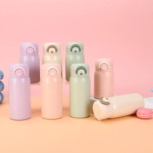 Mini stainless steel vacuum insulated cups with colorful pastel flip-top lids