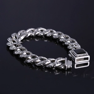 Silver vintage steel Cuban bracelet featuring rose pattern engraving and black stone