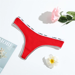 Red ribbed cotton thong with Love You waistband and decorative floral backdrop