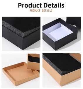 Detail view of black and kraft paper jewelry boxes with protective sponge inserts