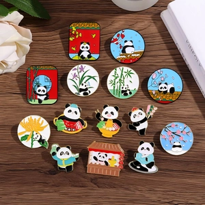 Chinese panda enamel pins collection on dark wood background with white roses