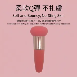 Pink mushroom head makeup sponge brush with coral handle for foundation application