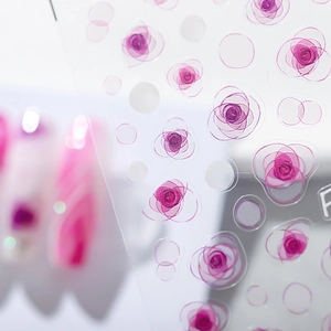 Pink rose floral nail art stickers with translucent finish and adhesive backing