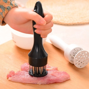 Dual cylindrical meat tenderizer tools in black and white with stainless steel needles