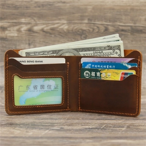 Detail view of crazy horse leather wallet interior with multiple card slots and ID window