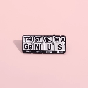 Creative enamel science lapel pin featuring periodic table elements spelling Genius