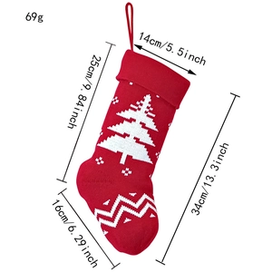 Red knitted Christmas stocking with white tree pattern and detailed dimension measurements