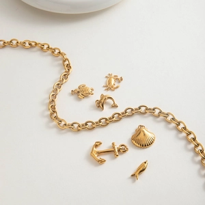 18K gold plated stainless steel thick cross chain with gold ocean theme charms