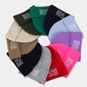 Knit beanie hat for men and women with embroidered letters in multiple colors