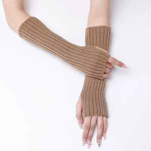 Detail of ribbed knit arm warmers in beige featuring fingerless design and elastic texture
