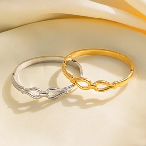 Minimalist titanium steel bangles with horseshoe buckle in gold and silver finish