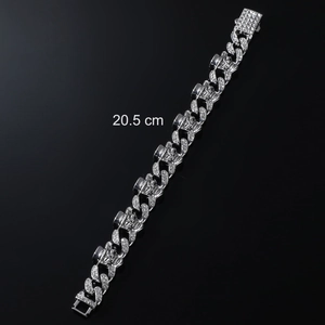 Detail shot of silver punk skull bracelet with clear zircons and 20.5 cm length mark