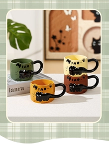 Macro detail of four assorted ceramic cat mugs featuring 3D embossed black cats and MIAO text
