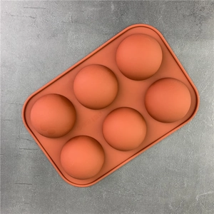 Brick red 6-cavity silicone sphere mold for baking chocolate mousse and handmade cakes