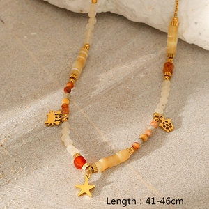 Detail of beaded shell necklace with starfish pendants and 41-46cm length guide