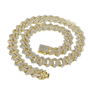 15mm gold Cuban link chain necklace with rhodium details and sparkling rhinestones