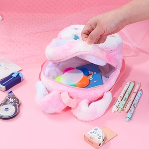 Cute pink plush unicorn backpack for girls with soft fur and spacious inner compartment
