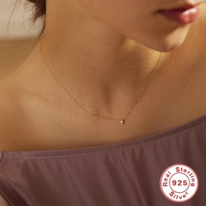 S925 sterling silver gold snake necklace with a delicate pearl and zircon pendant