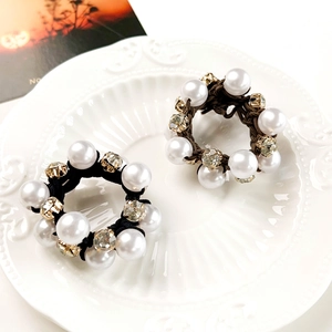 Elegant pearl and rhinestone hair scrunchies set in black and brown woven elastic