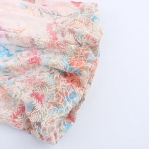 Floral embroidery shirt with puff sleeves in pink and blue pastel floral pattern