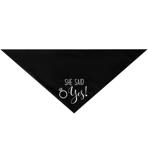 Detail of black cotton dog bandana with white She Said Yes text and ring icon print