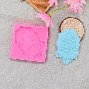Pink silicone mold and blue 3D cartoon girl figure for fondant and candle crafts