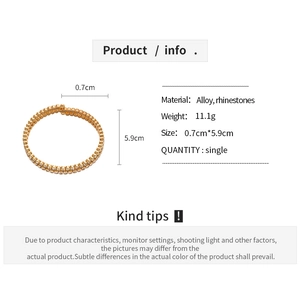 Detail view of double-layer rhinestone gold bracelet with size 5.9cm and 0.7cm measurements