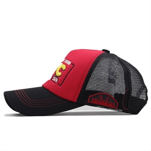 Detail of red and black mesh baseball cap with yellow 3D C embroidery and red stitching
