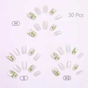 Cat eye pearl white press-on nails with green bamboo leaf pattern and 30 piece size set