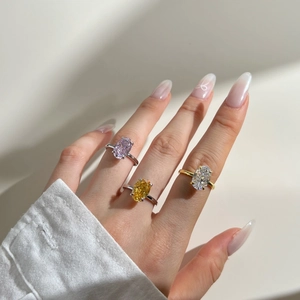 Three elegant S925 silver rings with oval cut pink yellow and clear zircon stones