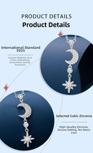 Detail view of S925 sterling silver star and moon pendant with cubic zirconia stones