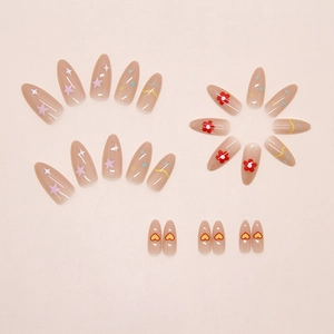 Detailed set of 24 almond-shaped press-on nails with red flower and polka dot patterns