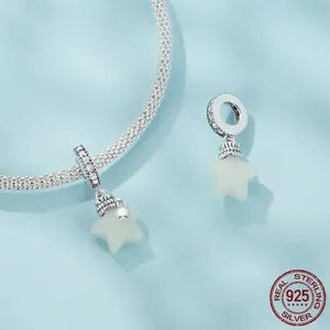 Star wishing bottle charm in 925 sterling silver with luminous stone on a woven bracelet