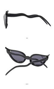 Vue latérale et arrière des lunettes de soleil œil-de-chat noires avec branches serpent