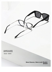 Close-up of square polarized sunglasses and silver metal glasses on minimalist podium
