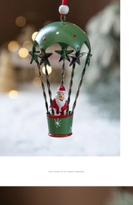 Detail of Nordic iron hot air balloon ornament with Santa Claus and festive text