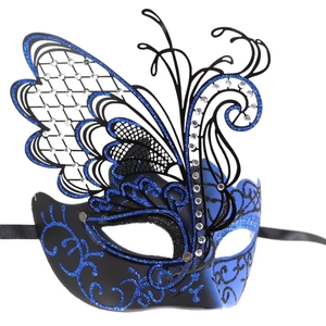 Detail of laser-cut butterfly masquerade mask with blue glitter and white rhinestones