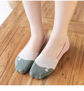 Detail of cotton no-show socks featuring cute rabbit embroidery and tricolor stitching